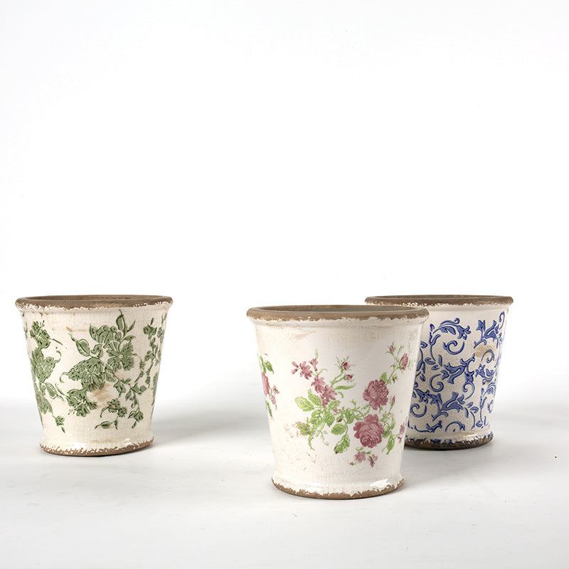 Decorative ceramic flower pot with floral design