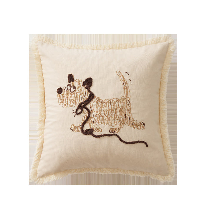 Decorative cushion cover with embroidered dog motif and fringed border