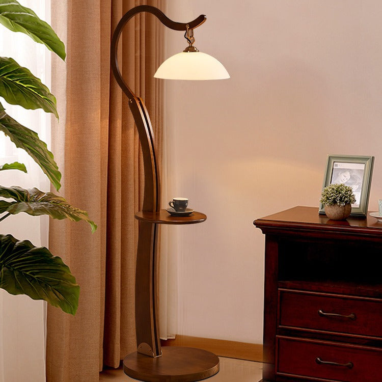Artistic floor lamp with integrated side table