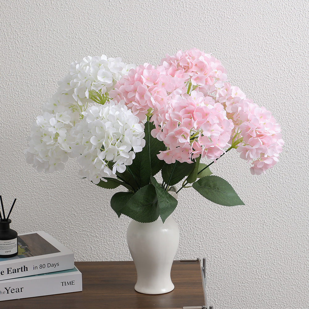 Decorative artificial flower arrangement