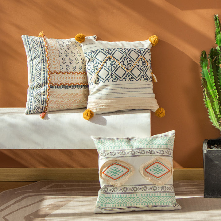 Square decorative pillow cover in Boho block print with braided tassels