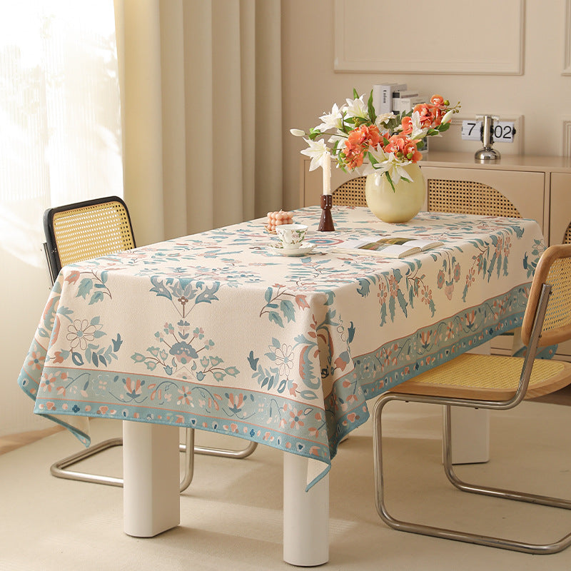 Rectangular easy-care tablecloth in floral jacquard with decorative border