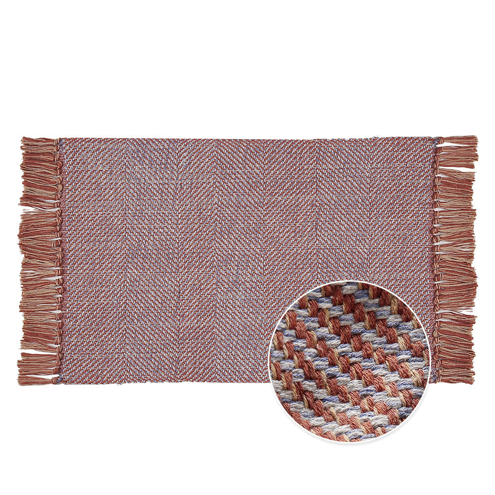 Woven table runner made of cotton blend with fine structure and herringbone look as well as decorative fringes