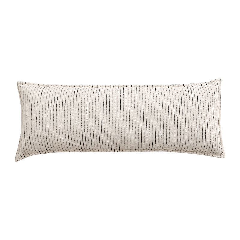Rectangular quilted decorative cushion with fine line embroidery and natural linen texture