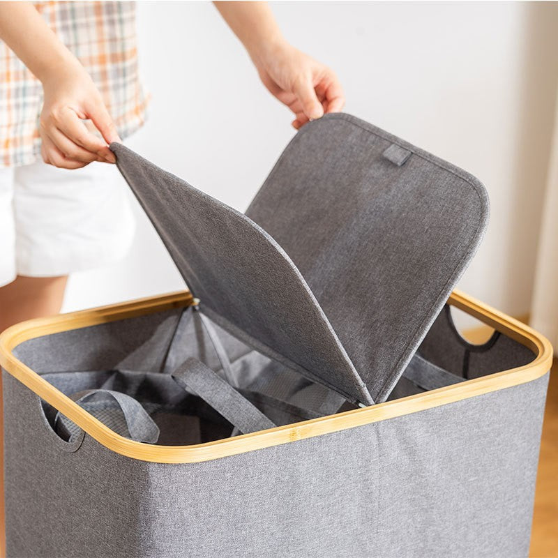 Storage basket with lid made of fabric and bamboo