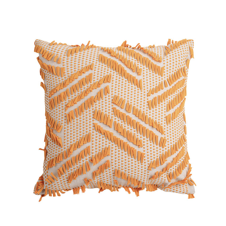 Decorative pillow with woven chenille relief structure and fringe application