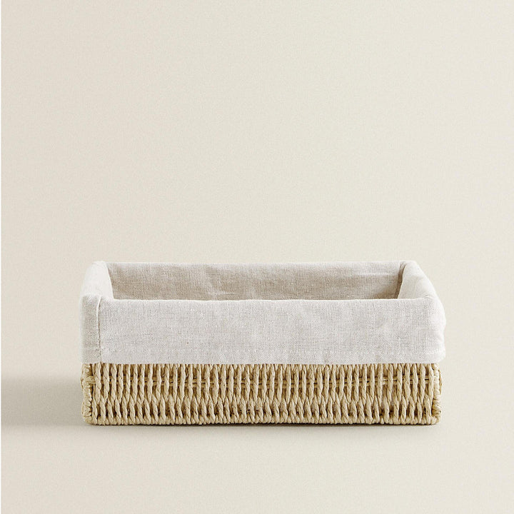 Natural storage basket with removable lining