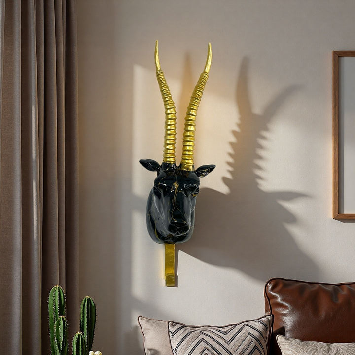 Wall hook in the form of a stylized unicorn