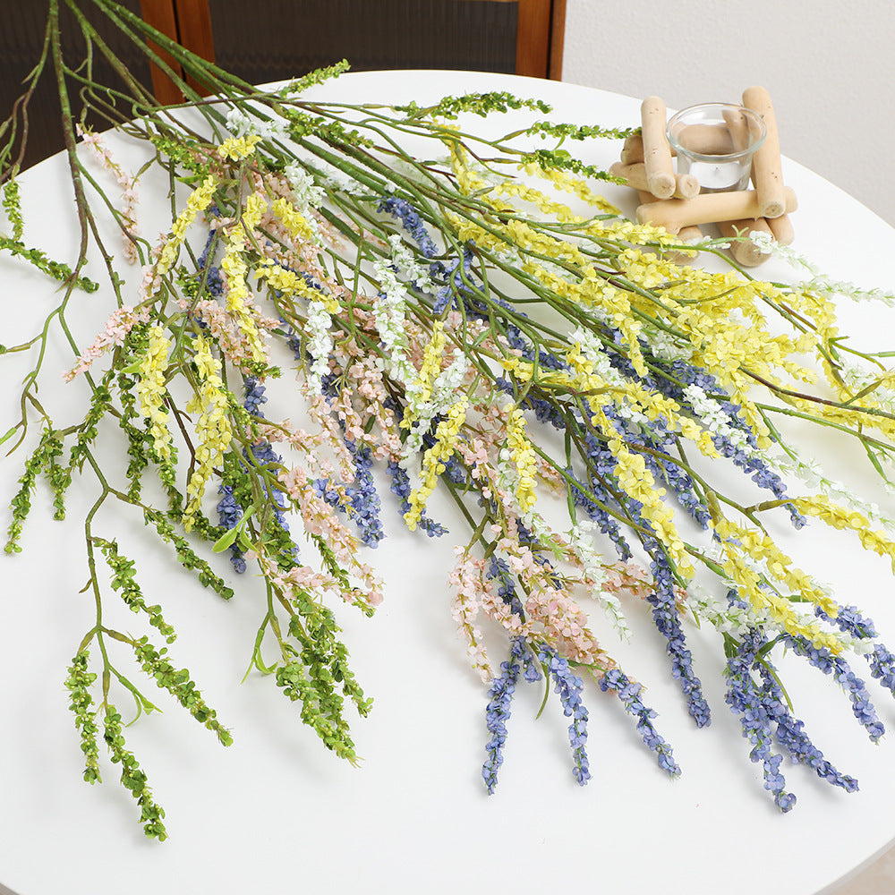 Artificial flower branch with fine pink flowers