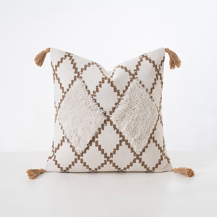 Square decorative cushion with boucle relief, zigzag and diamond pattern as well as tassels