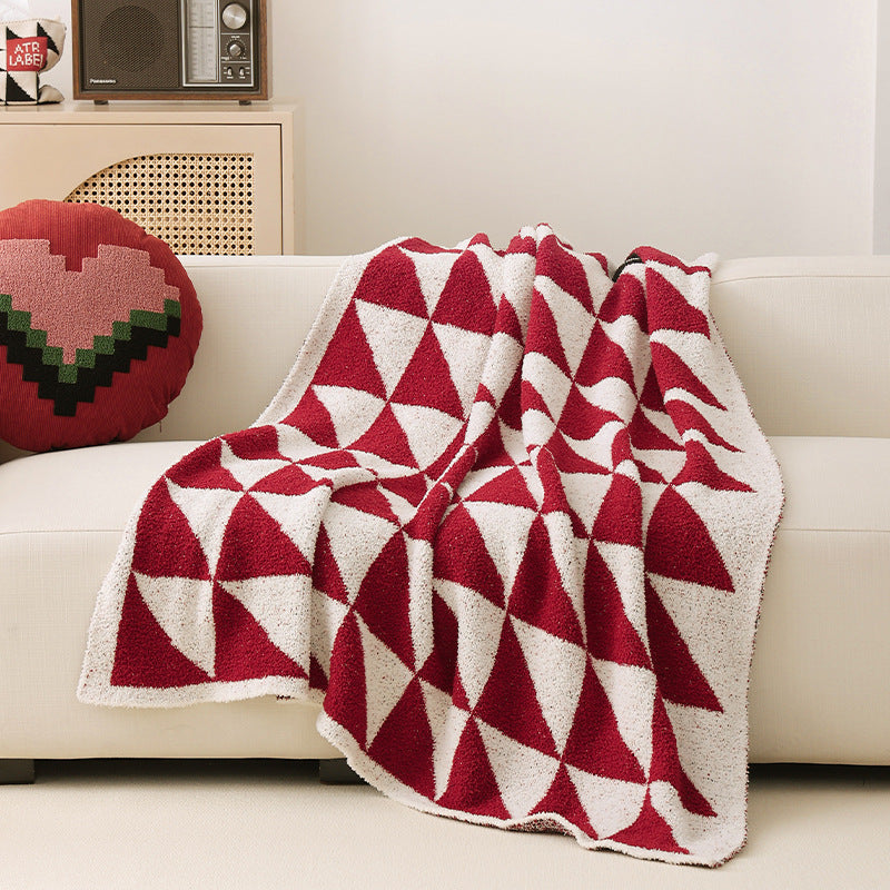 Coarsely woven decorative blanket with geometric jacquard pattern and soft bouclé