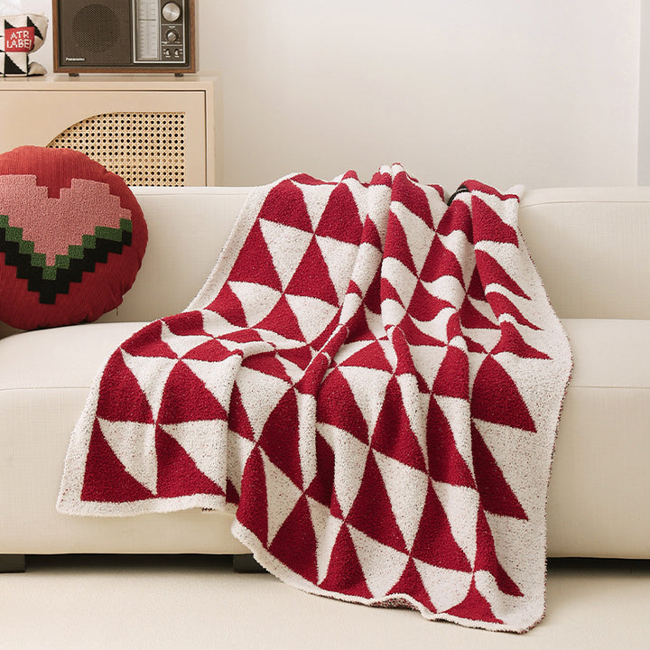 Coarsely woven decorative blanket with geometric jacquard pattern and soft bouclé