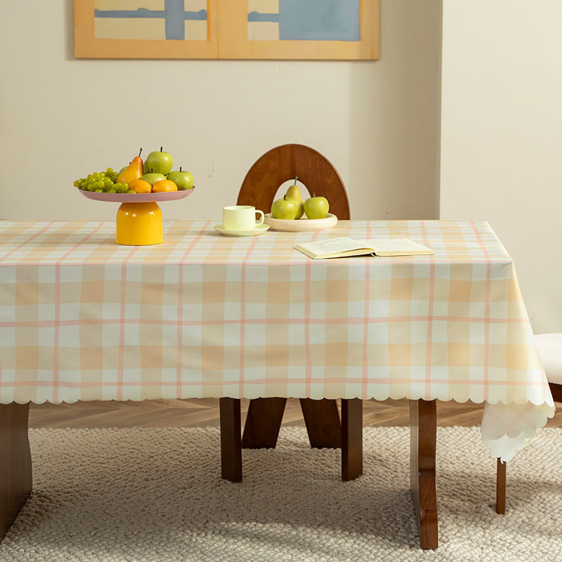 Washable checkered tablecloth with curved hem and water-repellent coating