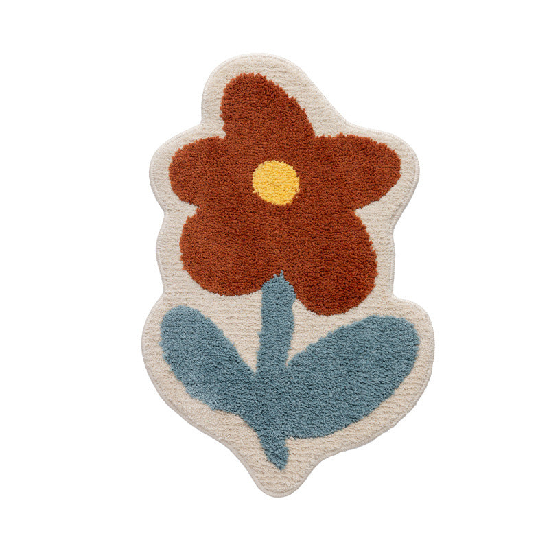Flower-shaped hand-tufted bath mat with voluminous pile and non-slip latex backing