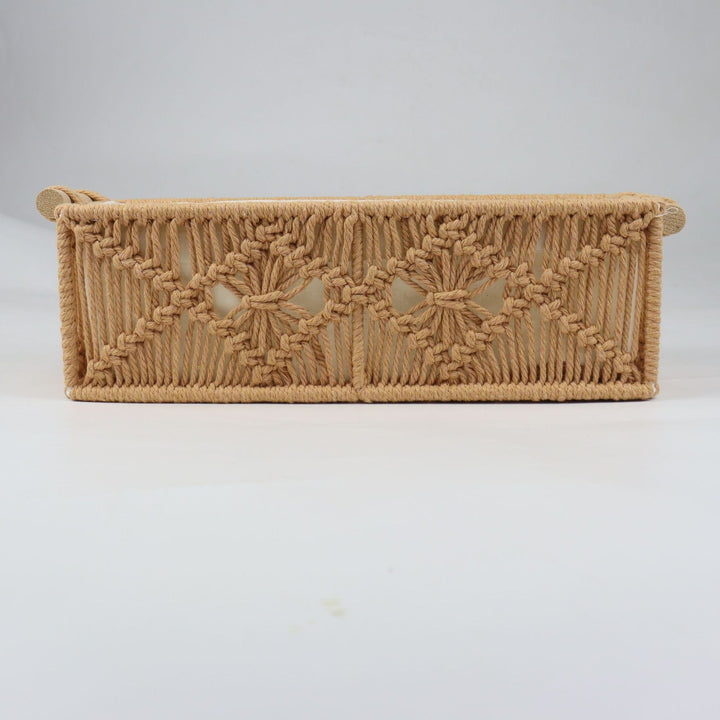 Storage basket with macrame pattern