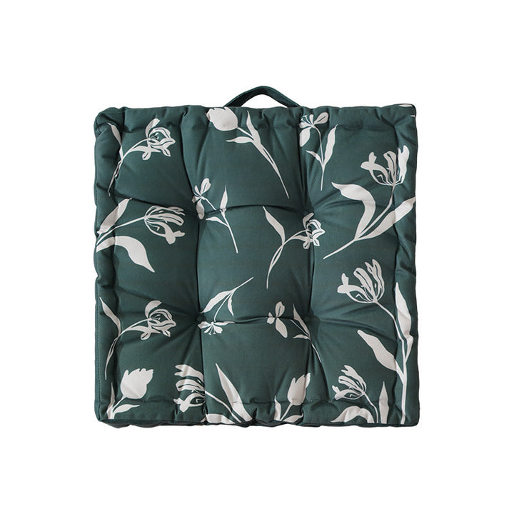 Padded chair cushion with carrying handle and decorative stitching