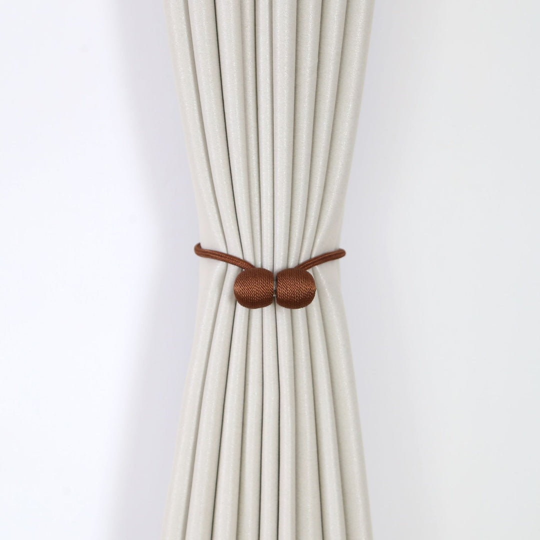Decorative curtain tieback