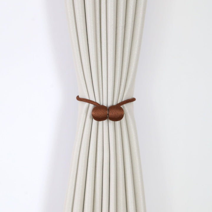 Decorative curtain tieback