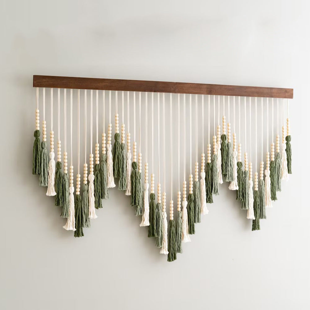 Artful macramé wall hanging with gradient and elegant tassels