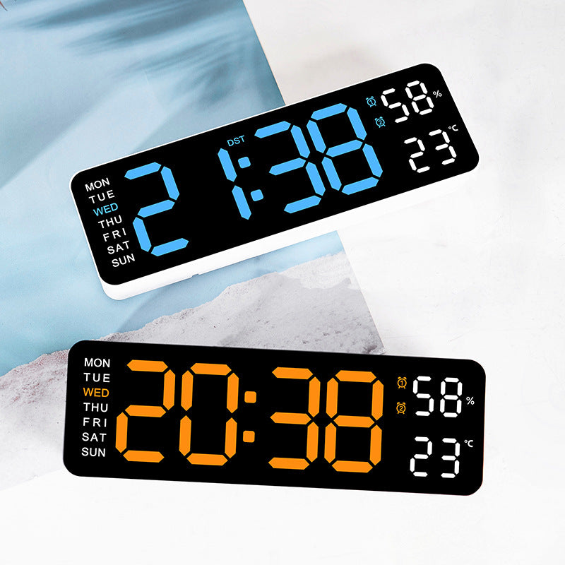 Digital alarm clock with room temperature and humidity display
