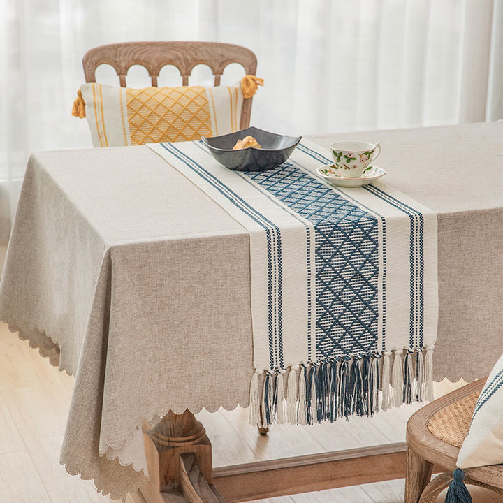 Handwoven cotton table runner with ethnic diamond pattern and fringes
