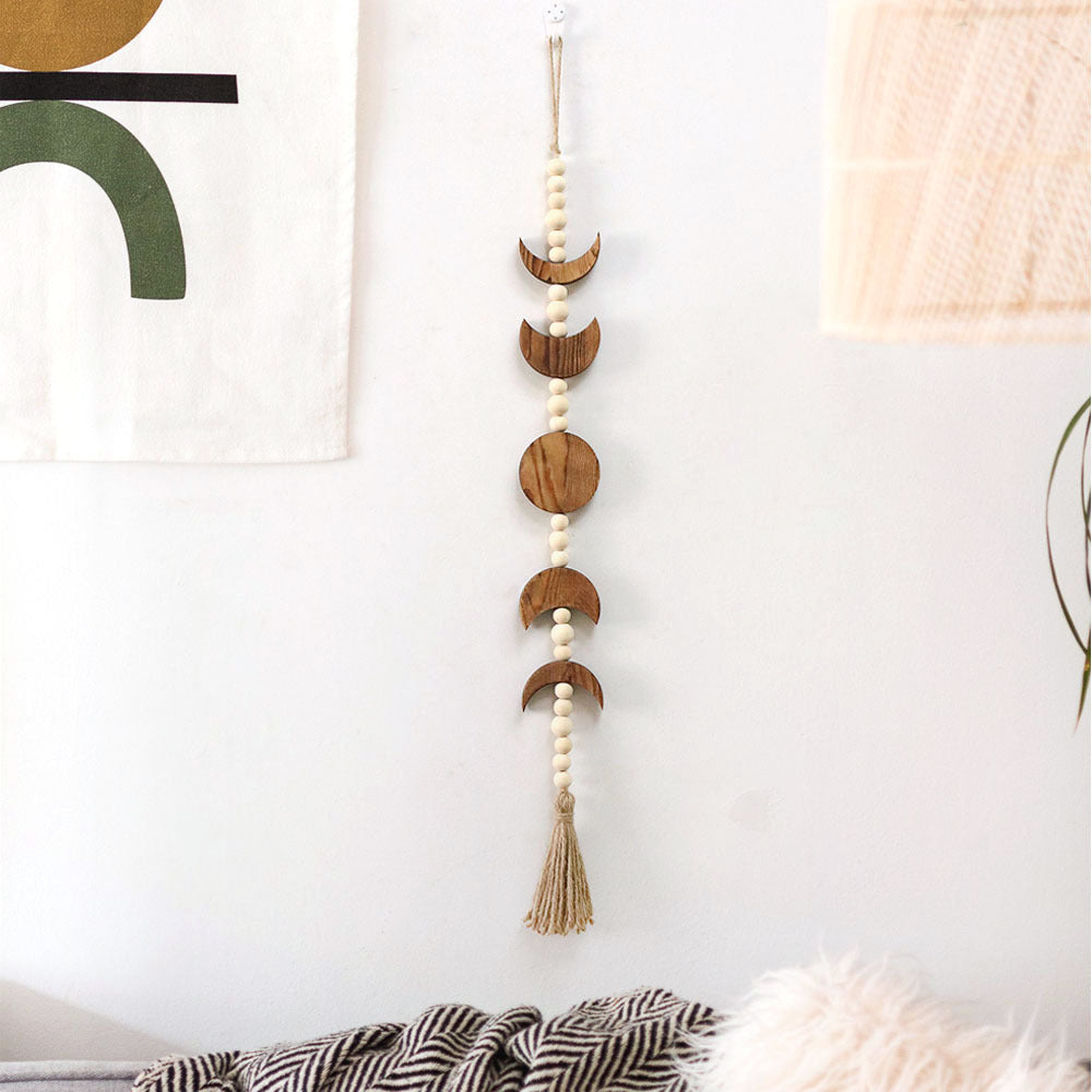Decorative wall hanging with geometric wooden shapes