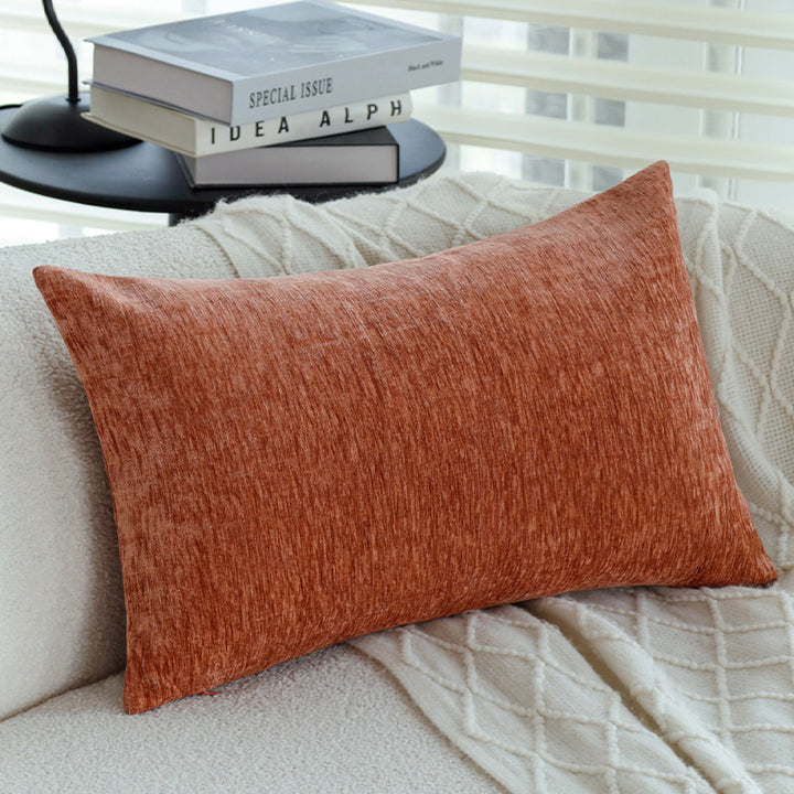 Square sofa cushion cover made of textured plush with fine piping