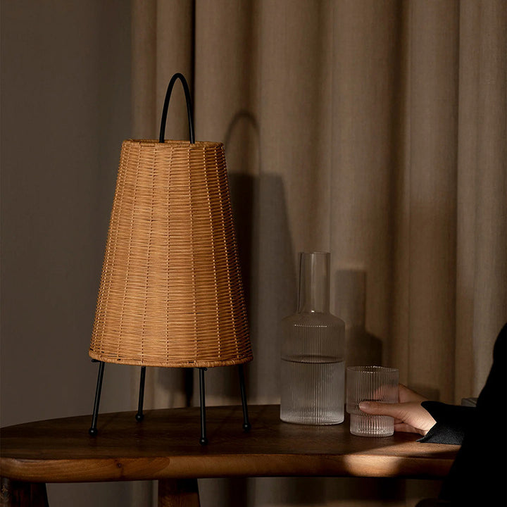 Elegant table lamp made of woven material