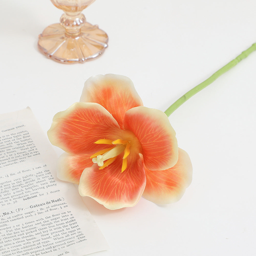 Artificial orchid flower branch with intricately detailed flowers