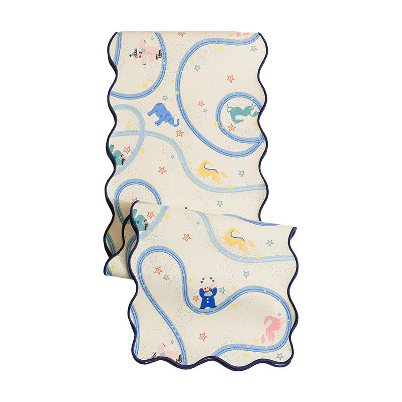 Play mat for babies and toddlers with wavy edge and playful animal print