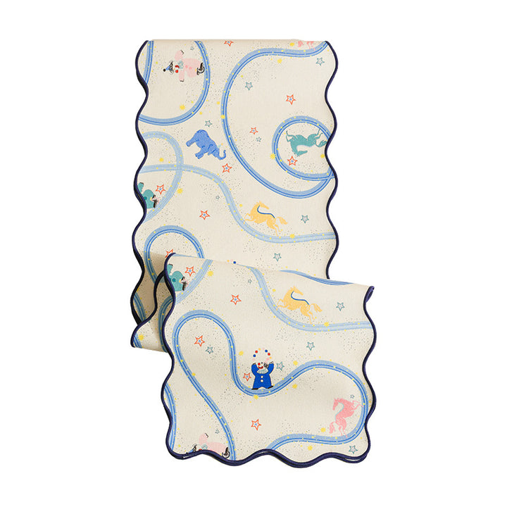 Play mat for babies and toddlers with wavy edge and playful animal print