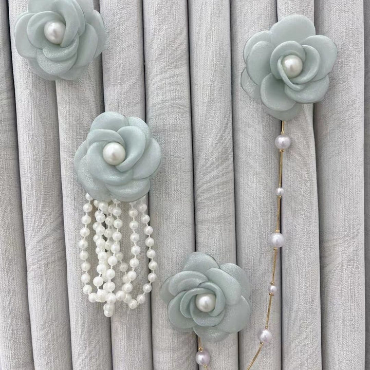 Decorative curtain clip with flower design