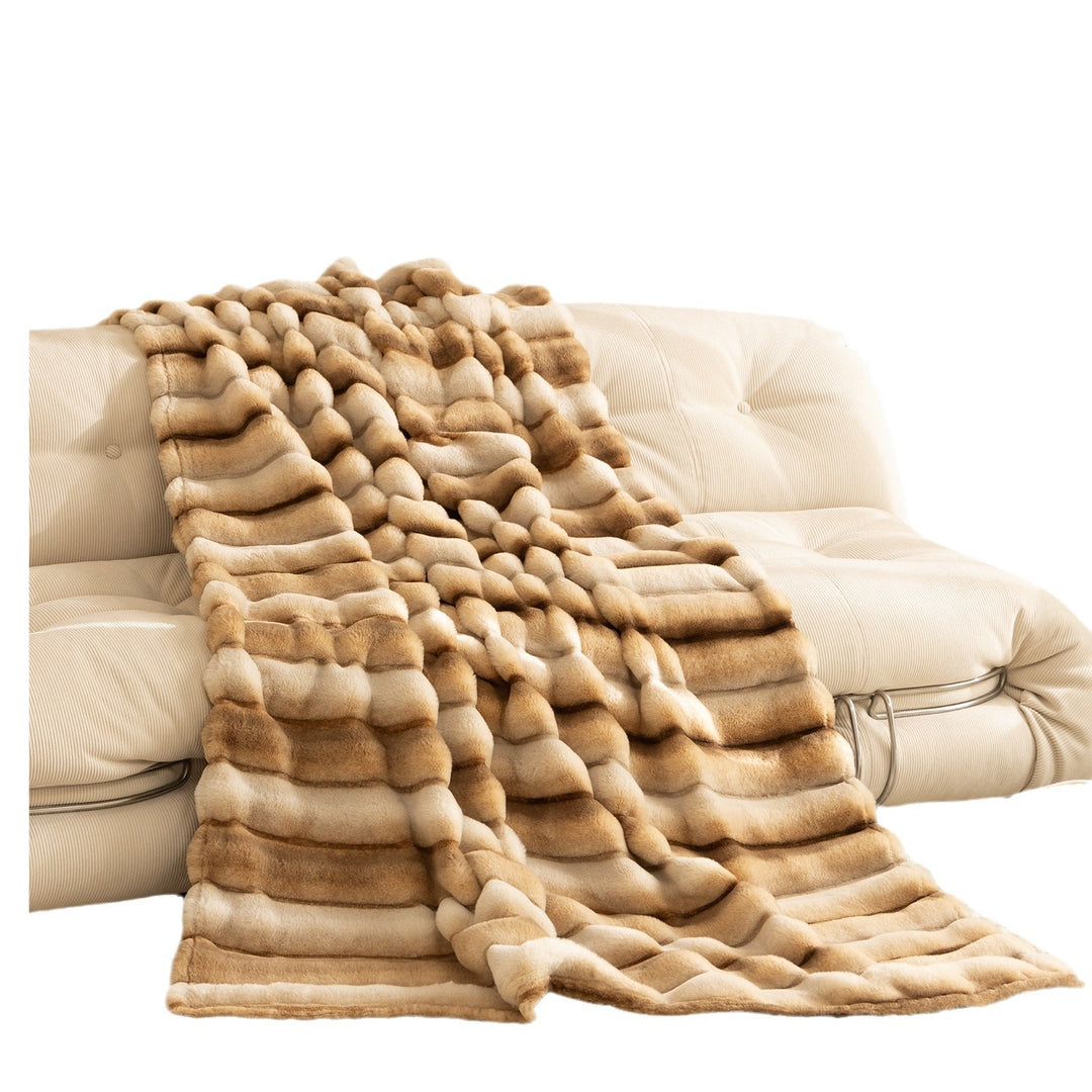 Luxurious cozy faux fur blanket with quilted relief pattern