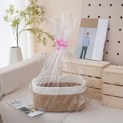 Natural storage basket with ribbons