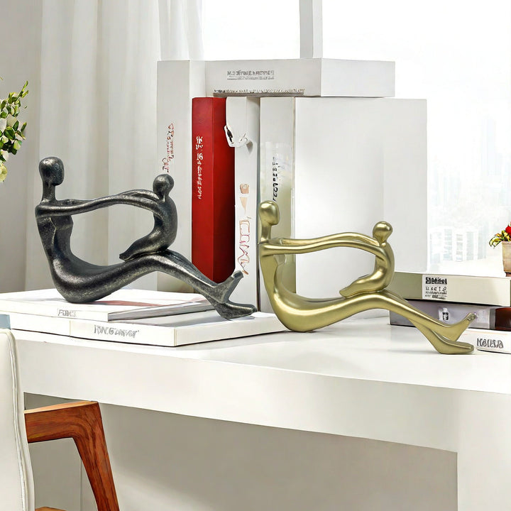Stylish sculpture with intertwined figures