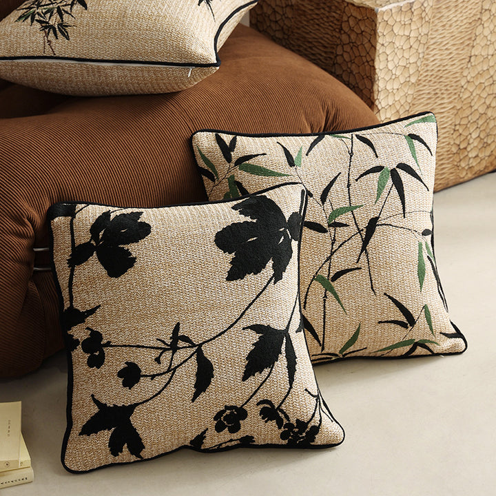 Woven decorative cushion cover with bamboo leaf jacquard and contrast piping