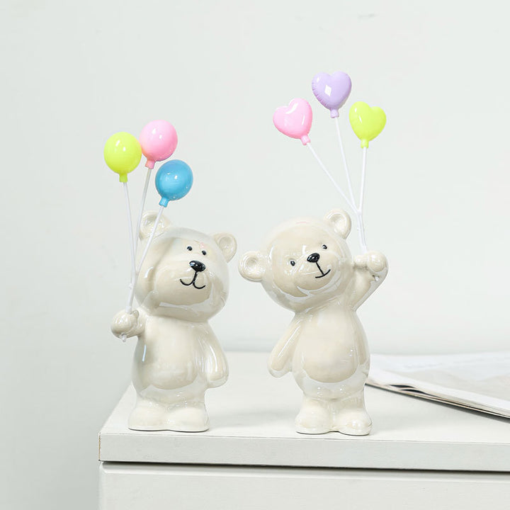 Cute ceramic bear figurine with balloons
