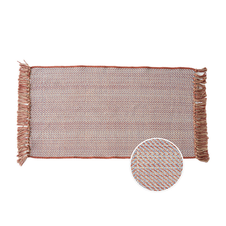 Woven table runner with dense herringbone jacquard and fringes