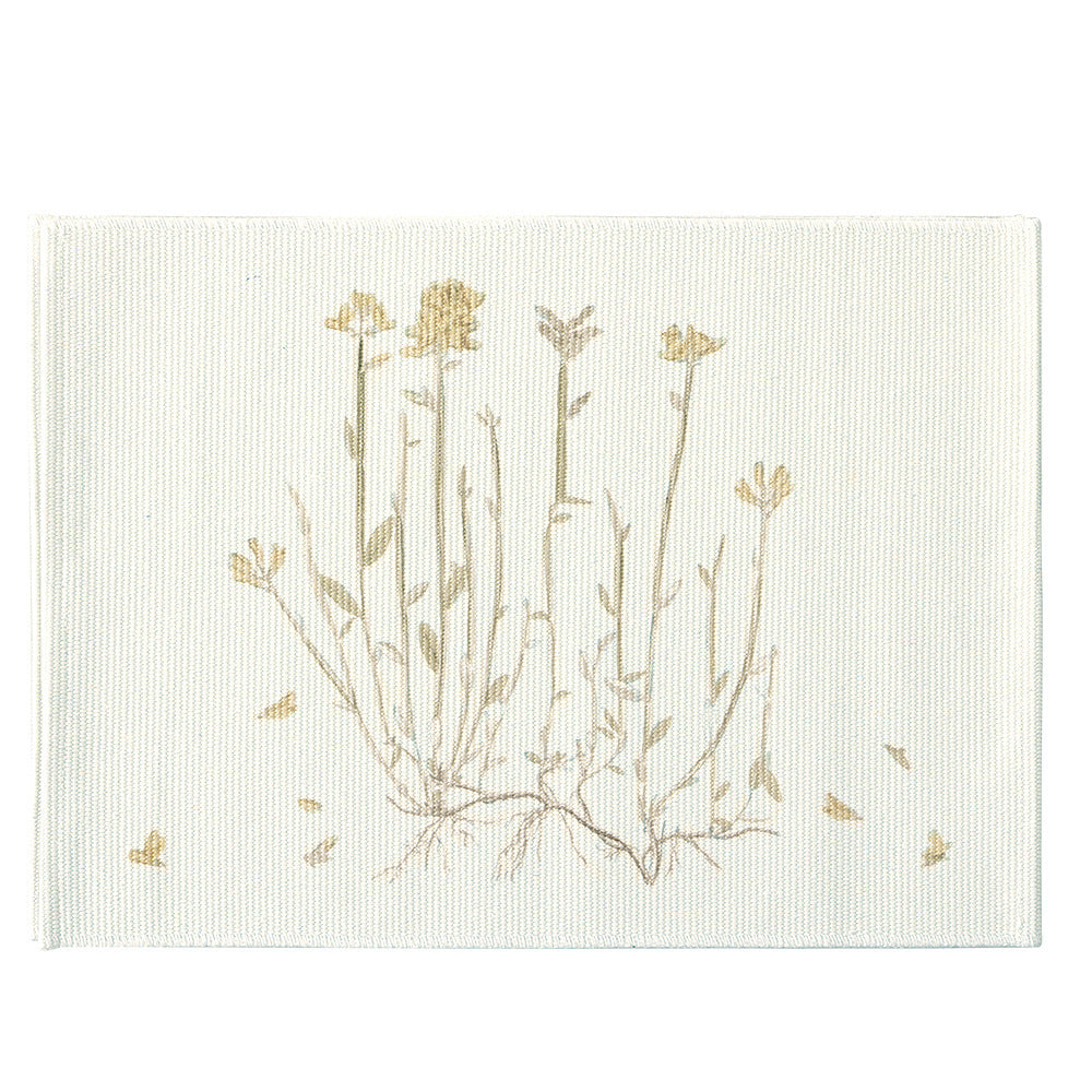 Woven placemat with botanical wildflower print and non-slip backing