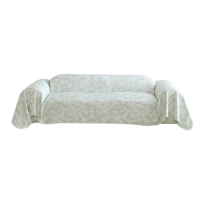Elastic sofa cover with floral relief structure and universal fit