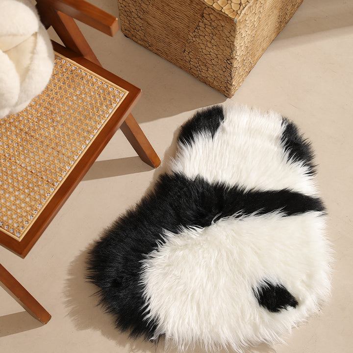 Plush cuddly pillow in sheep shape with dense artificial fur and soft polyester filling