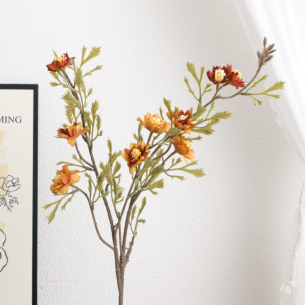 Elegant artificial flower branch with detail-loving blossoms