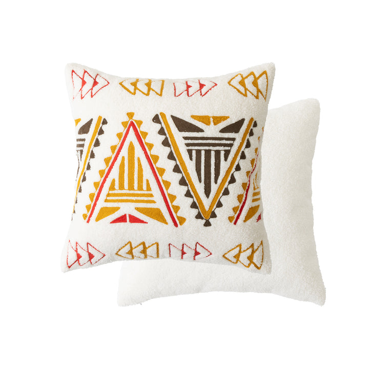 Bouclé pillow with hand-stitched ethnic design and removable cover