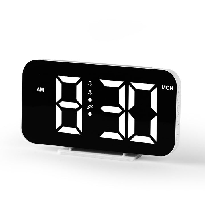 Digital radio alarm clock with large LED digits