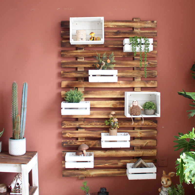 Wall shelf system with integrated storage boxes