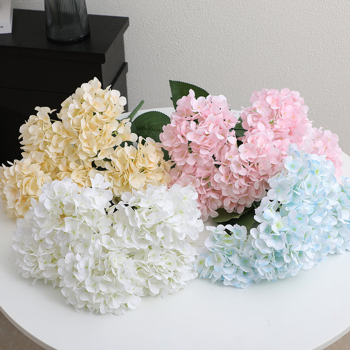 Decorative artificial flower arrangement