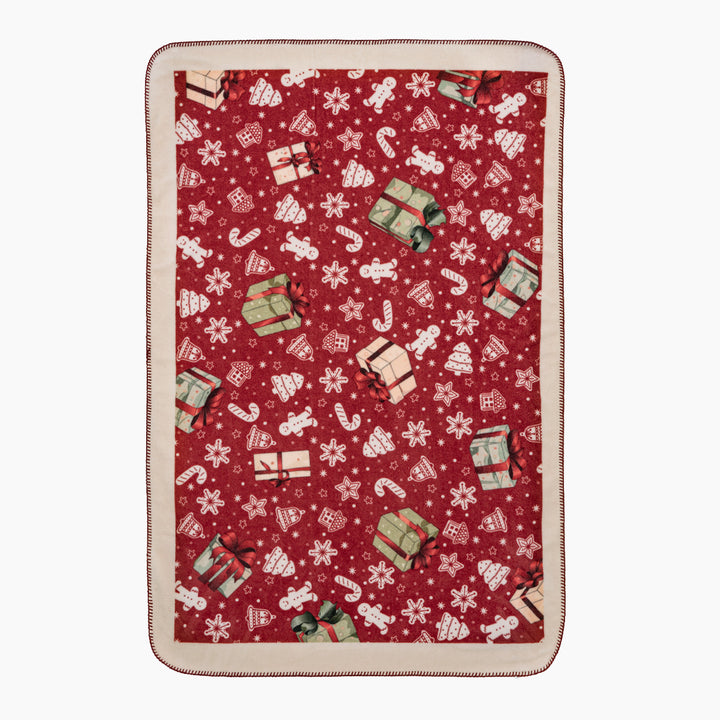 Christmas cuddle blanket with gift and gingerbread pattern