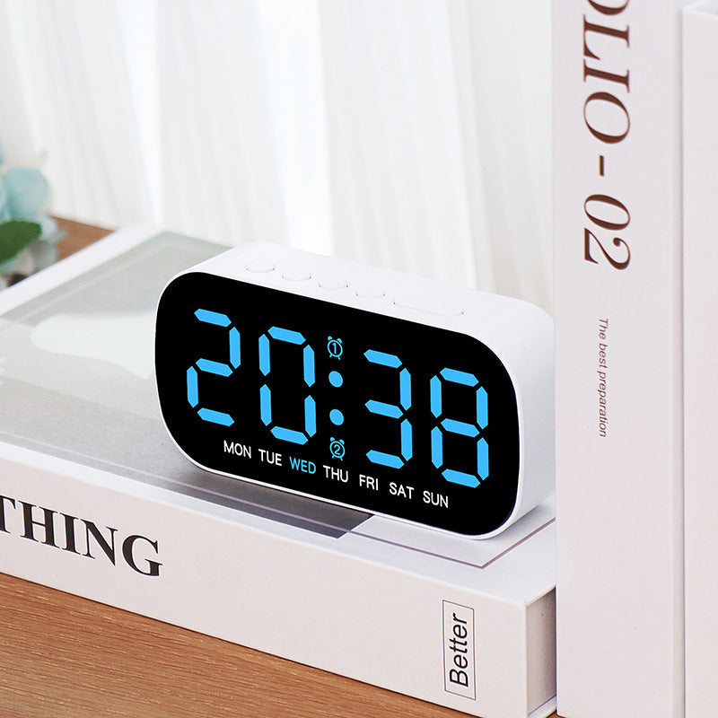 Digital alarm clock with LED display and temperature display