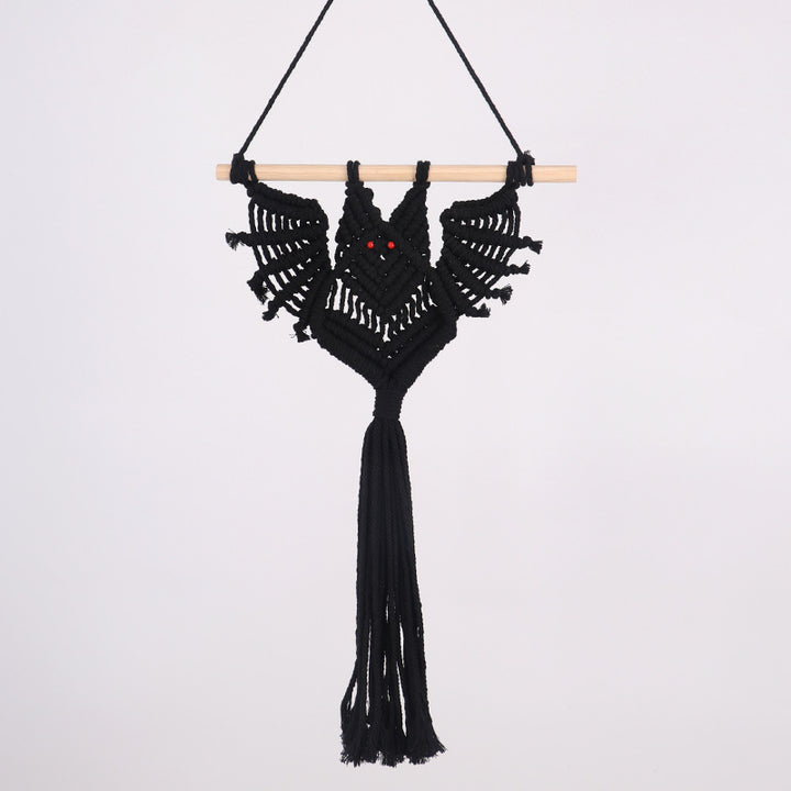 Macrame plant hanger with decorative design