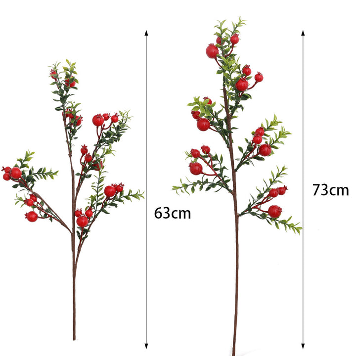 Artificial branch with glowing red berries